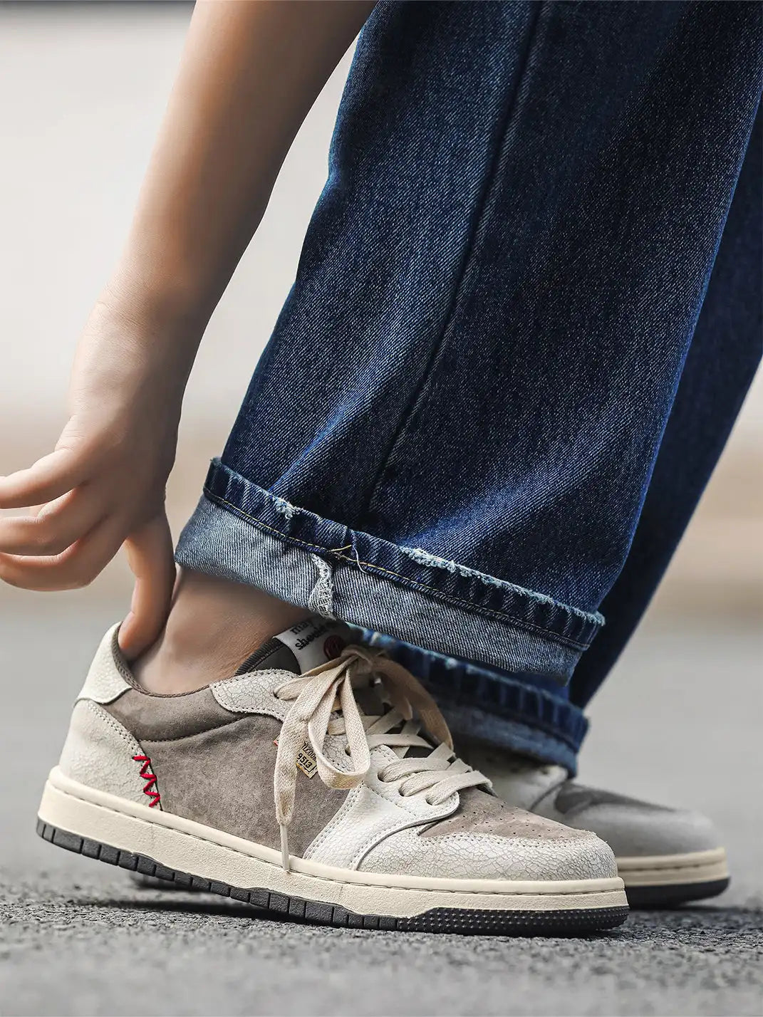 Low top trainers displayed at a three-quarter angle