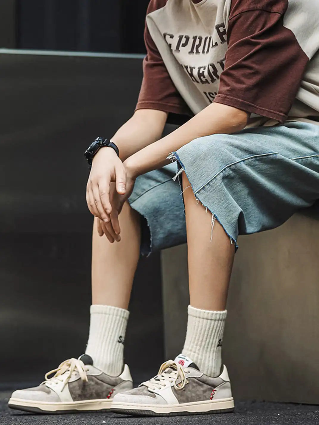 Side profile of casual suede panel trainers