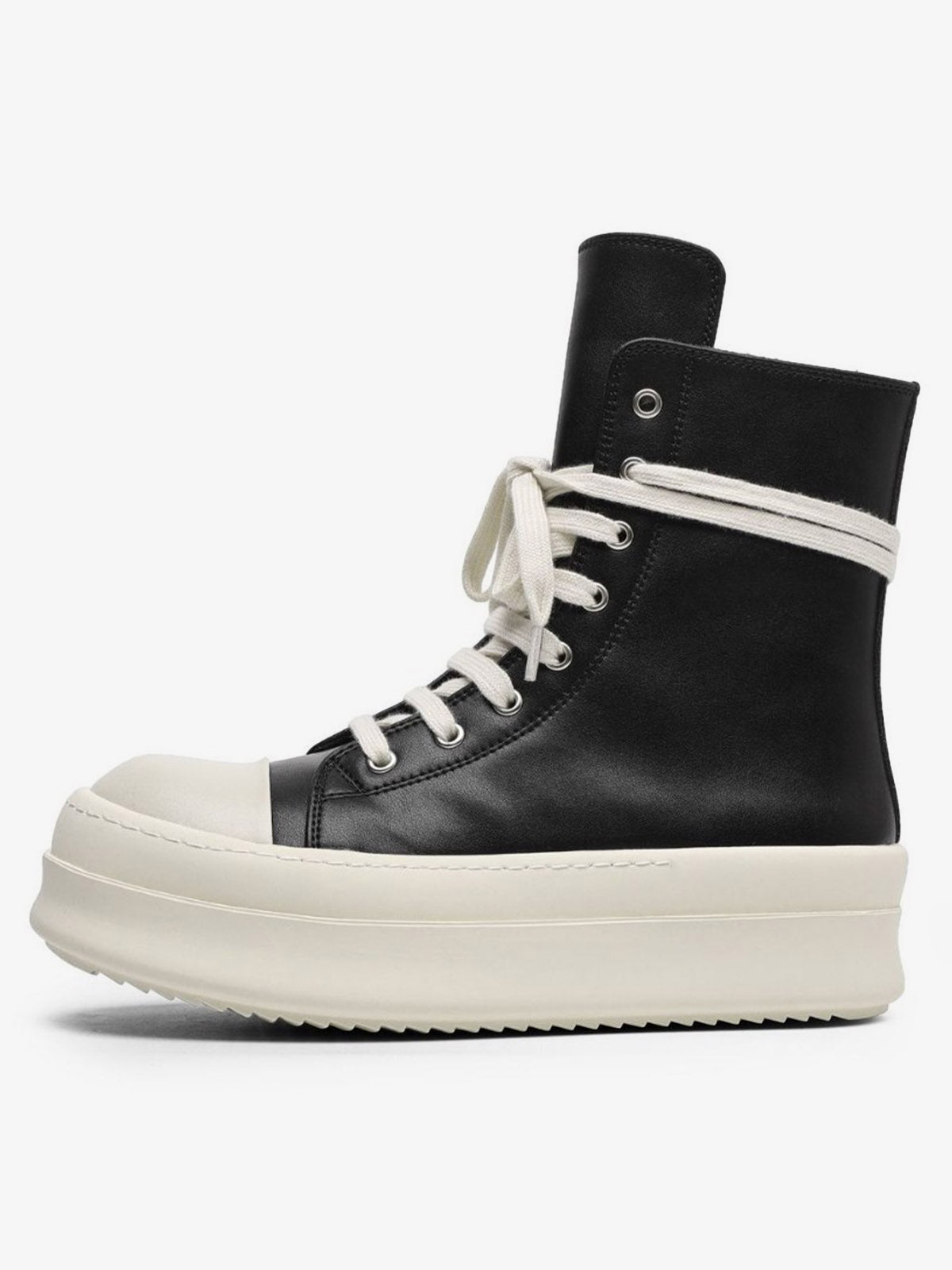 Platform high top sneakers showing the lace-up front and side fastening