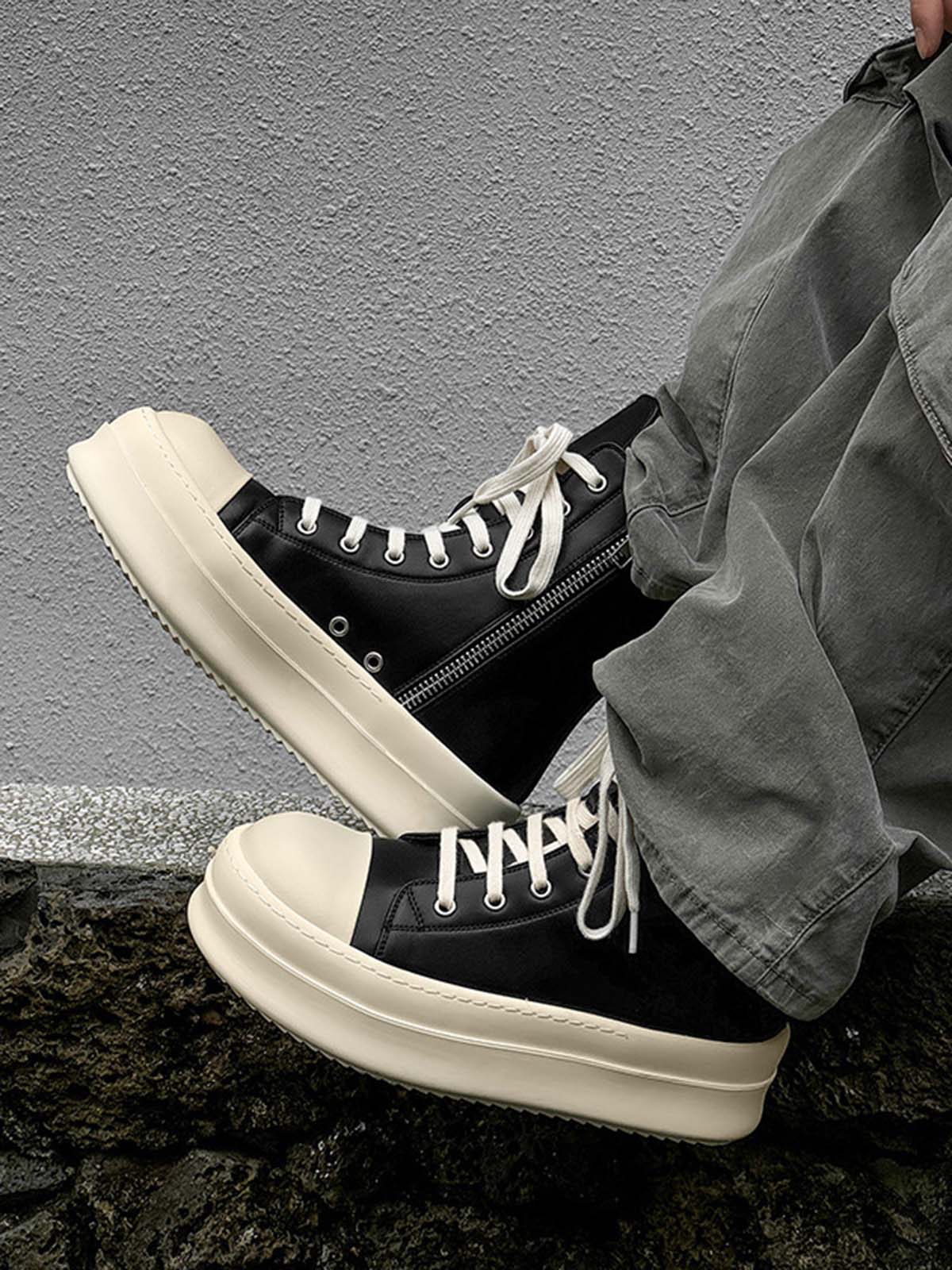 Close-up of the side zip on platform high top sneakers