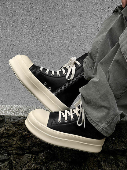 Close-up of the side zip on platform high top sneakers