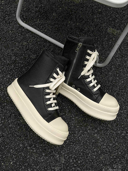 Pair of high top platform sneakers presented together
