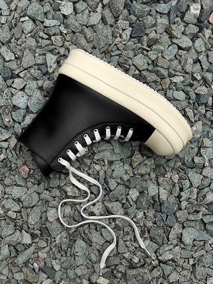 Platform sneakers viewed from above showing the high top shape