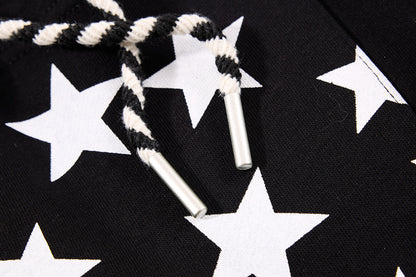 Close-up of the star print detail on the sweatpants