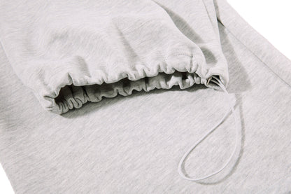 Back view of relaxed-fit sweatpants with star print detailing