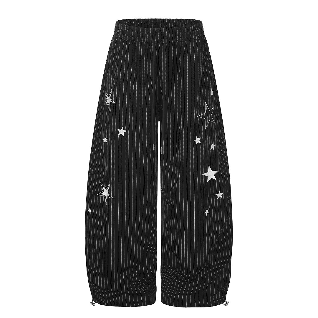 Close-up of the star embroidery on the baggy barrel sweatpants