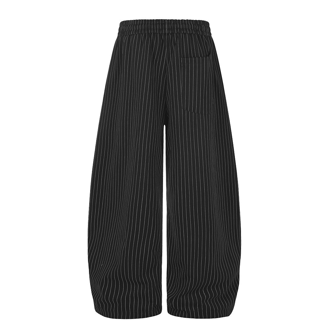 Relaxed-fit sweatpants showing the distinctive barrel-leg cut