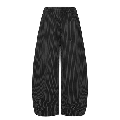 Relaxed-fit sweatpants showing the distinctive barrel-leg cut