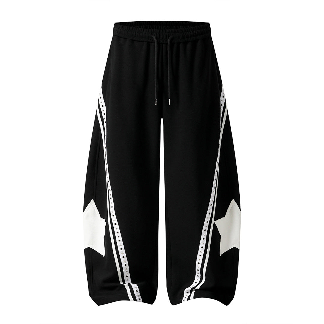 Front view of relaxed baggy barrel sweatpants with curved panel detailing