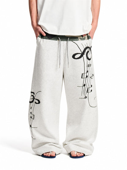 Camouflage baggy sweatpants with a relaxed barrel fit