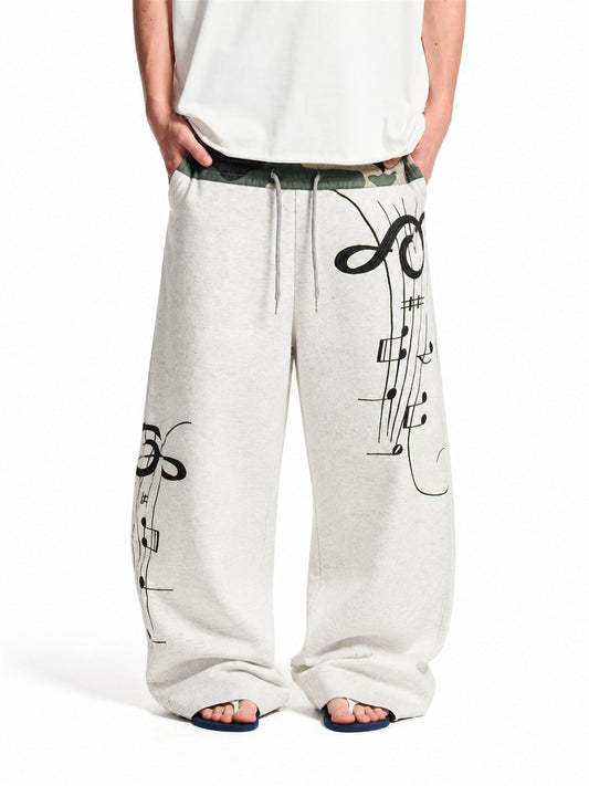 Camouflage baggy sweatpants with a relaxed barrel fit