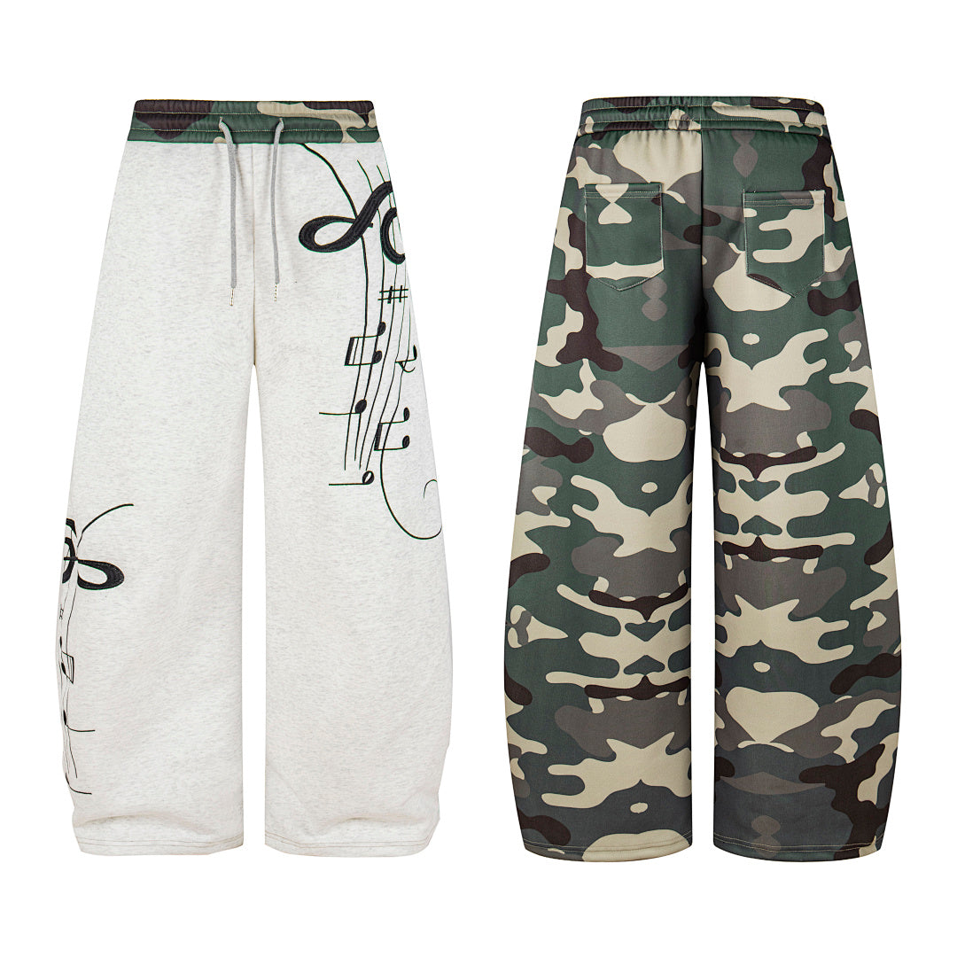Full-length view of relaxed camouflage barrel-fit sweatpants