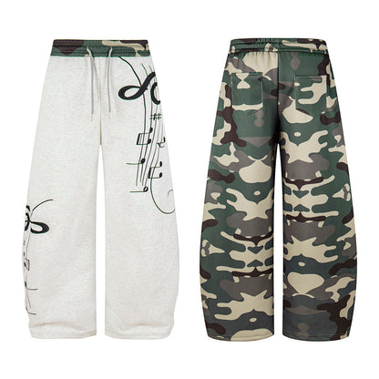 Full-length view of relaxed camouflage barrel-fit sweatpants