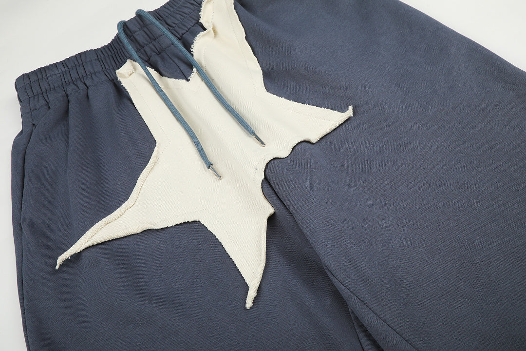 Side view of oversized joggers with wide leg styling