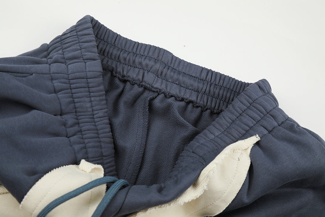 Detail view of the wide leg hem on oversized joggers