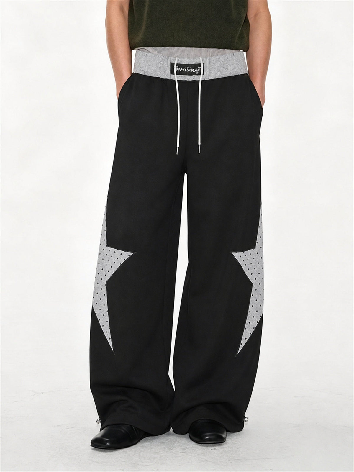 Baggy sweatpants featuring a star panel and layered waist