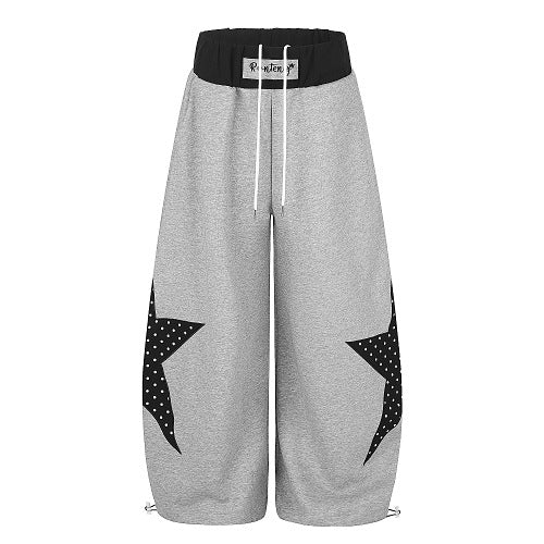 Close-up of the layered waist detail on baggy sweatpants