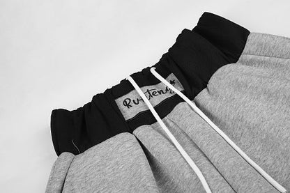 Full-length view of relaxed star panel sweatpants