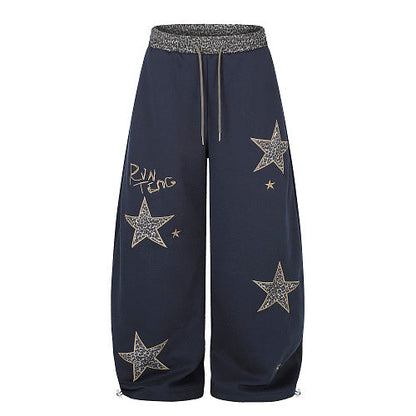Front view of leopard star baggy sweatpants with a relaxed fit