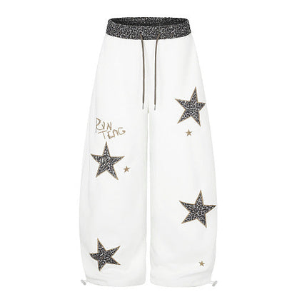 Leopard star sweatpants featuring a bold all-over print