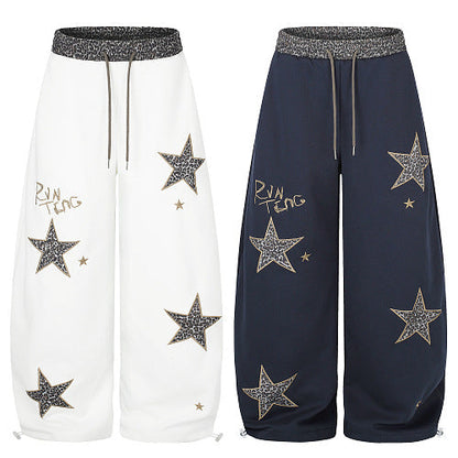 Baggy streetwear trousers with leopard and star detailing