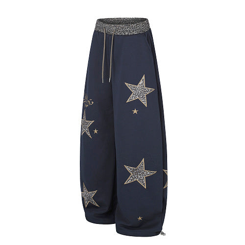 Full-length view of leopard star relaxed-fit sweatpants
