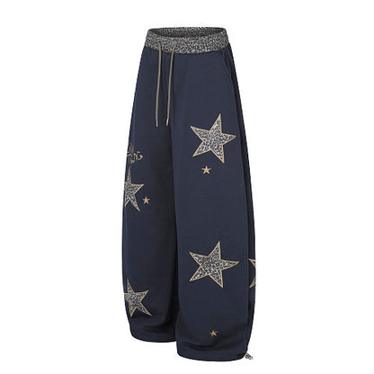 Full-length view of leopard star relaxed-fit sweatpants