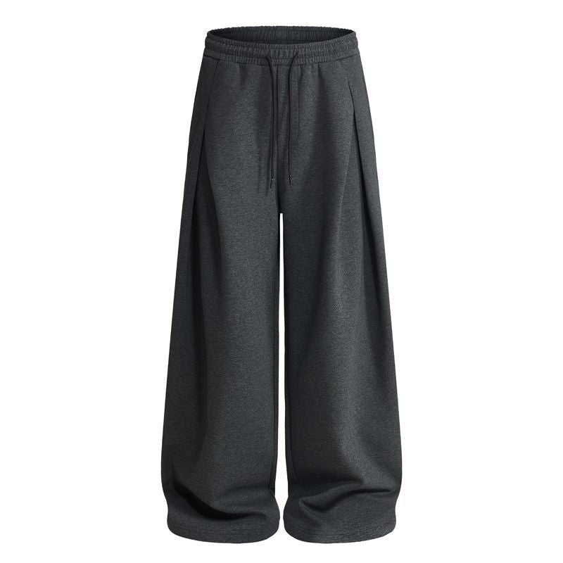 Relaxed-fit pleated sweatpants displaying the elasticated waistband