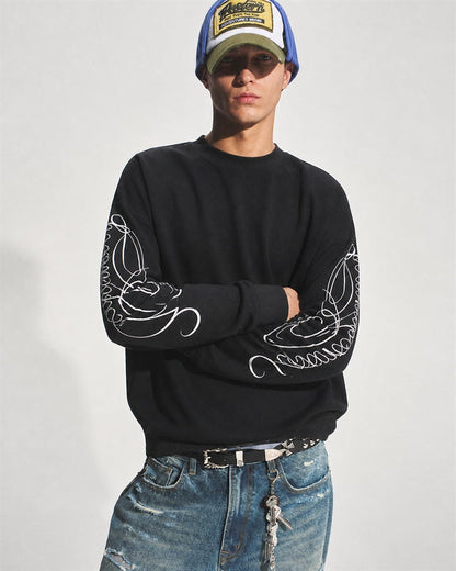 Leopard print embroidered long sleeve sweatshirt shown from the front
