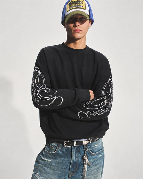 Leopard print embroidered long sleeve sweatshirt shown from the front