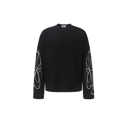 Close-up of the embroidered leopard print detail on the sweatshirt