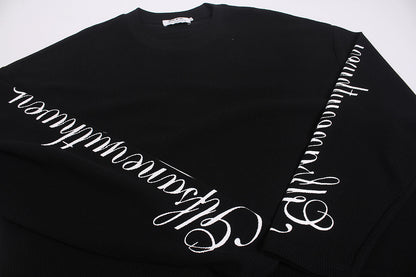 Cuff and sleeve detail on the embroidered long sleeve sweatshirt
