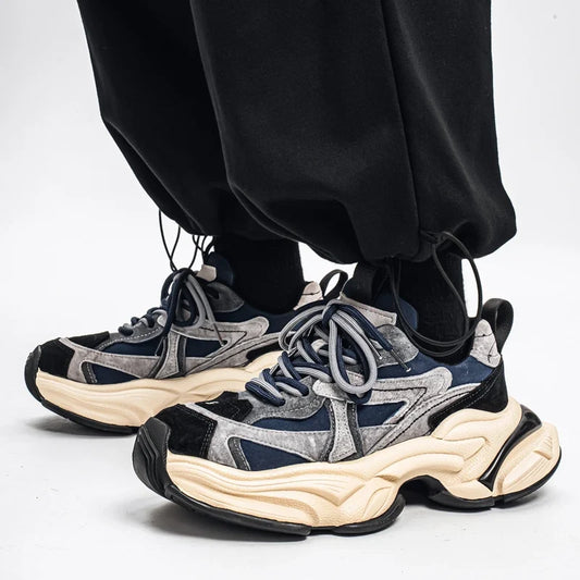 Thick sole height increasing sneakers shown from the side