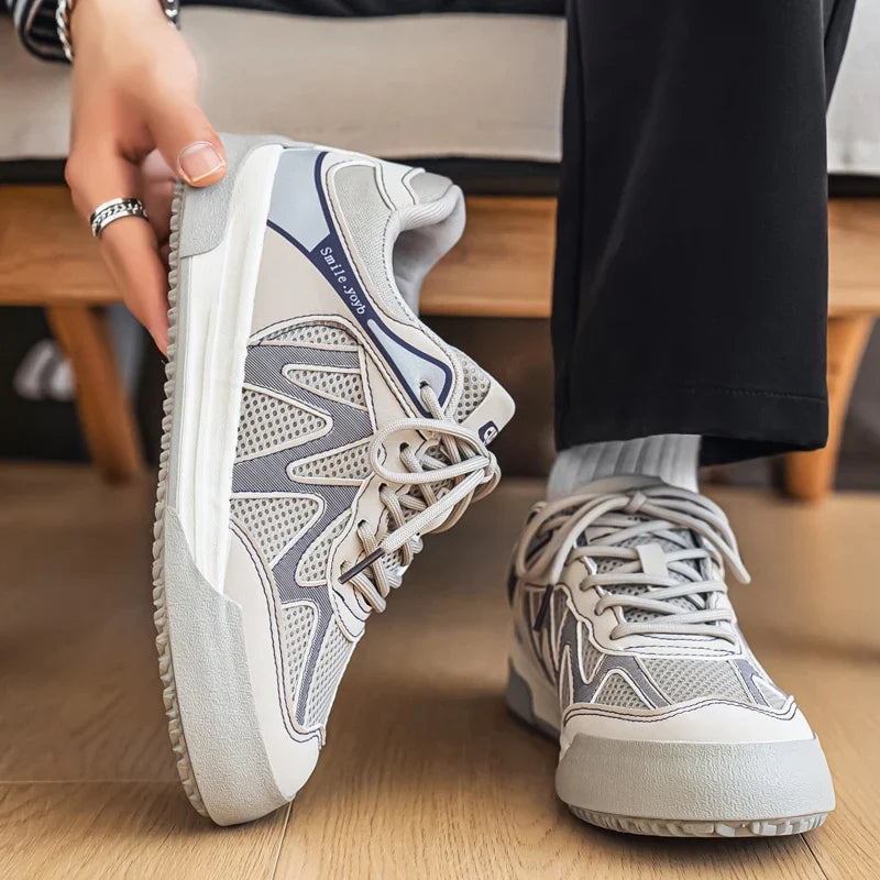 Side view of the trainers highlighting the flat sole