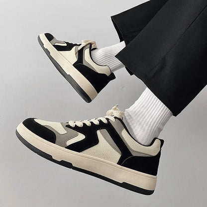 Pair of canvas trainers shown from the side with breathable fabric uppers