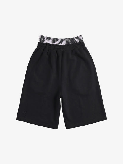 Close-up of double waistband on heathered cotton-blend shorts
