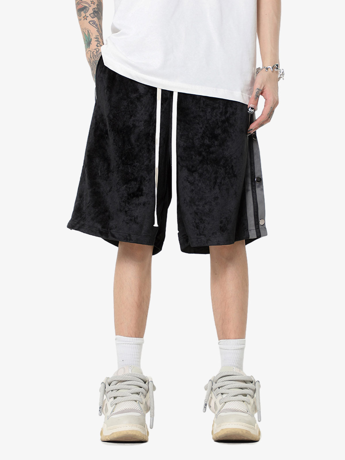 Waistband detail of suede athletic shorts