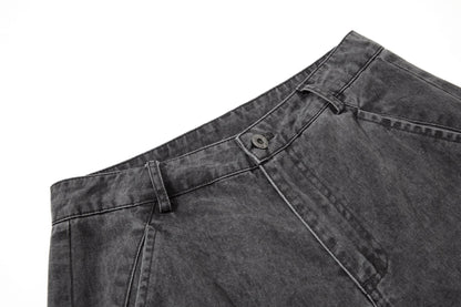 Close-up of cargo trouser fabric with a washed cotton finish