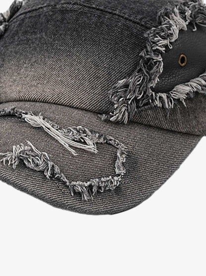 Angled view of casual ripped denim baseball cap