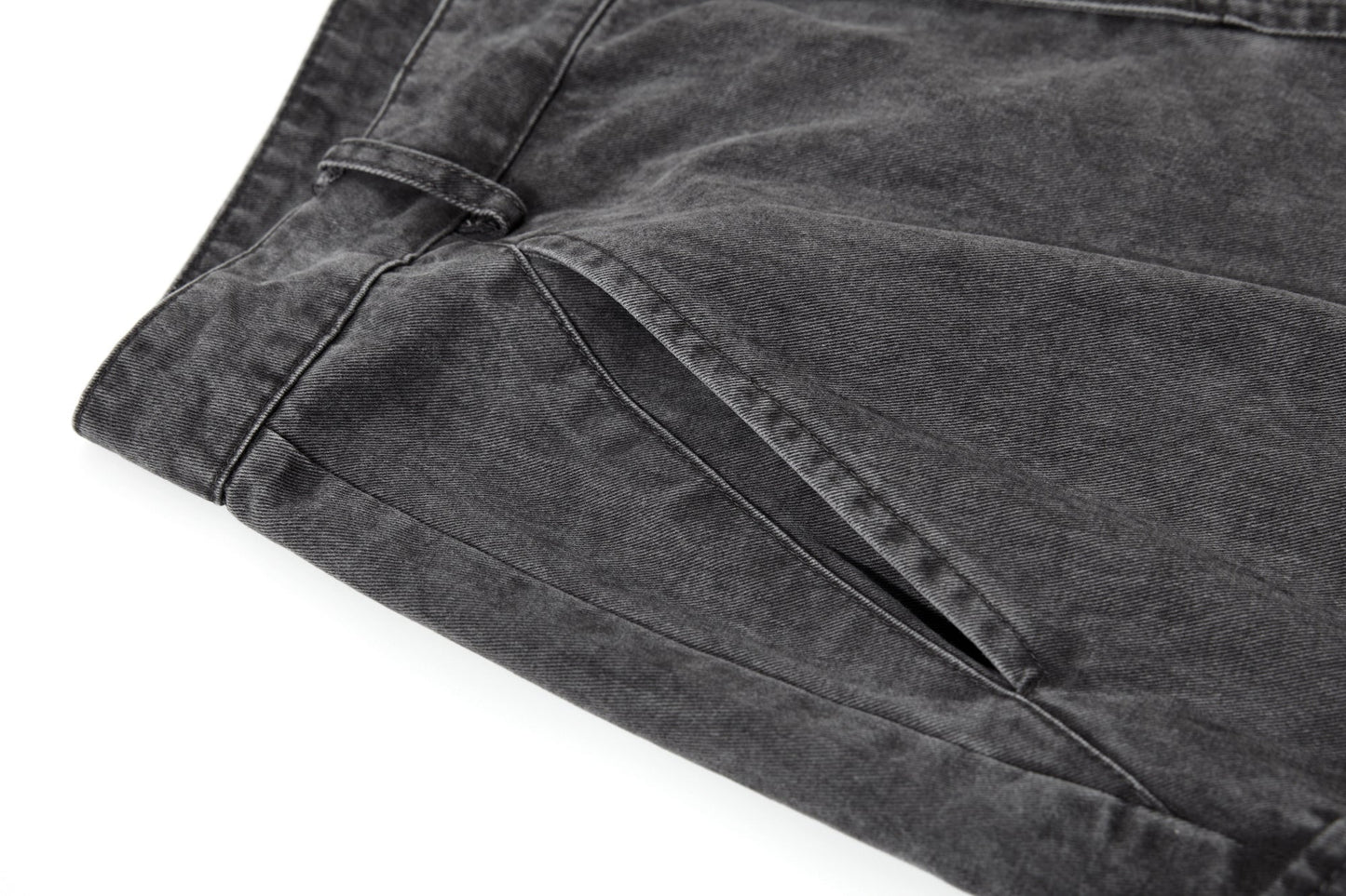 Full-length view of washed cargo trousers in a casual streetwear outfit