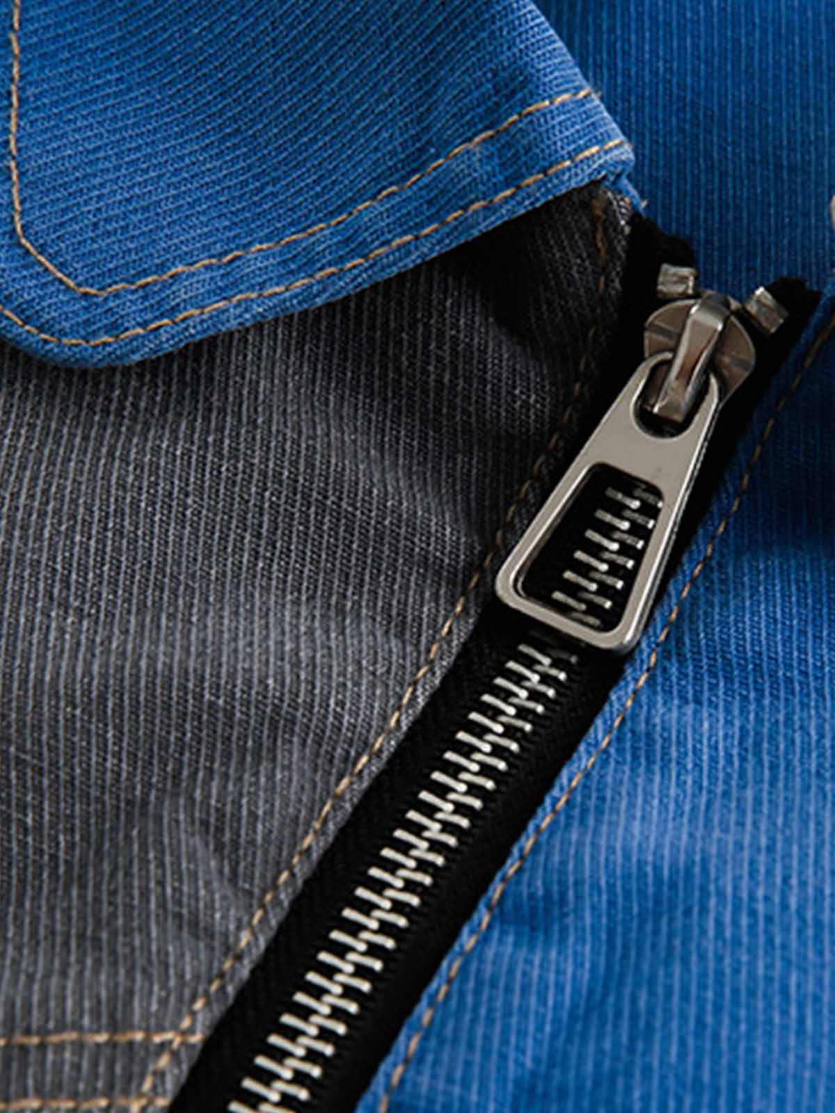 Close view of the colour-block patchwork detail on the jacket