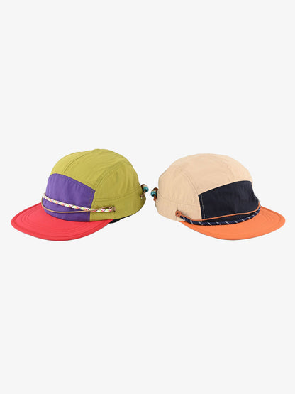 Close-up of beaded strap on colour block 5-panel cap