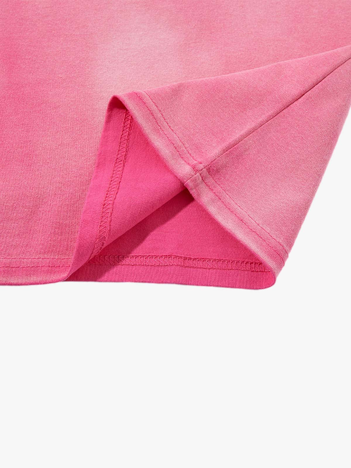 Folded oversized washed cotton T-shirt highlighting the faded finish