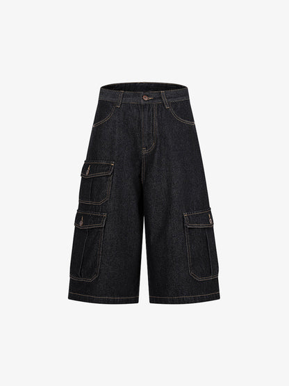 Front view of dark wash denim shorts with adjustable waist tabs