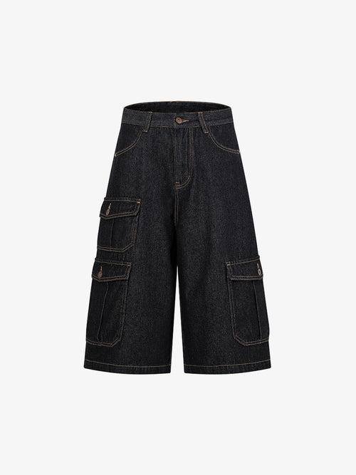 Front view of dark wash denim shorts with adjustable waist tabs