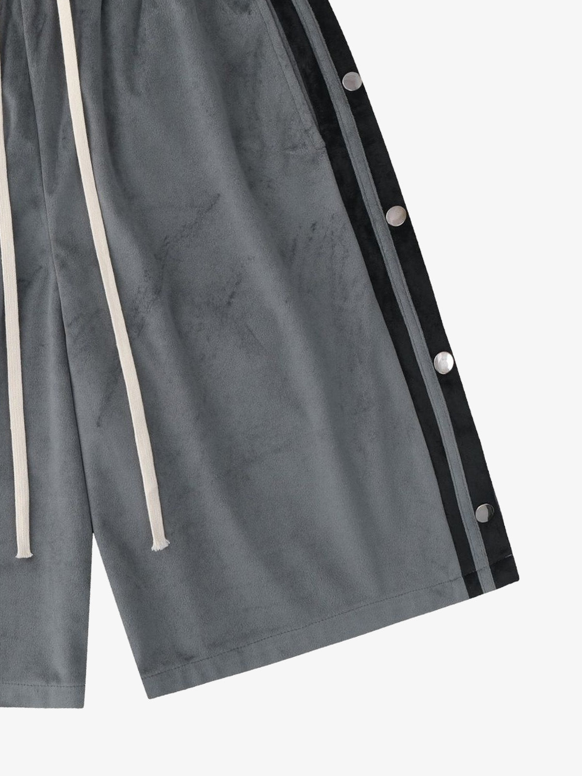 Front angled view of suede athletic shorts
