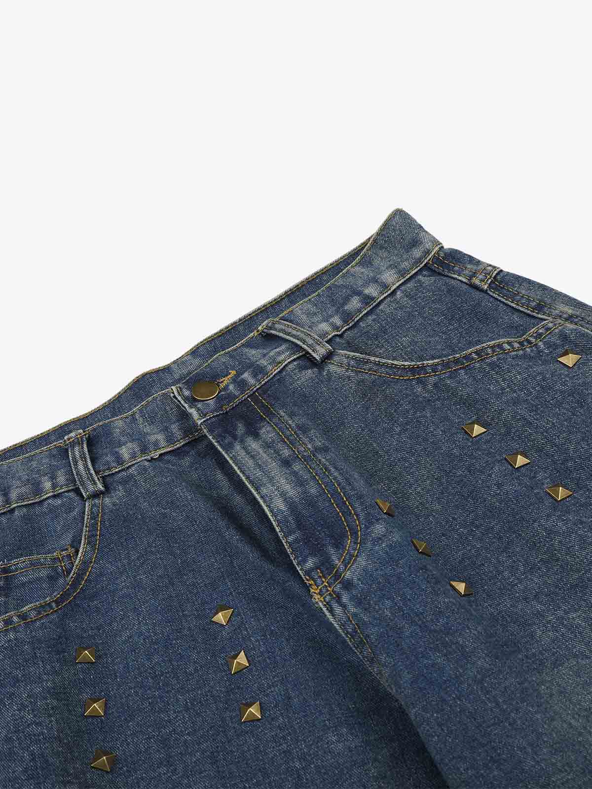 Side view of studded wide-leg jeans with faux fur cuffs