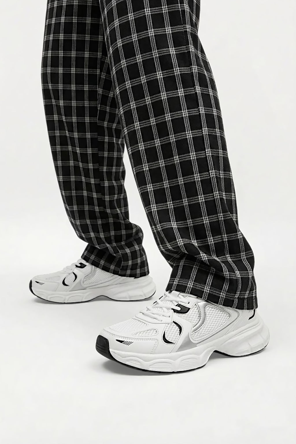 Close-up of chunky trainers showing their retro-inspired design