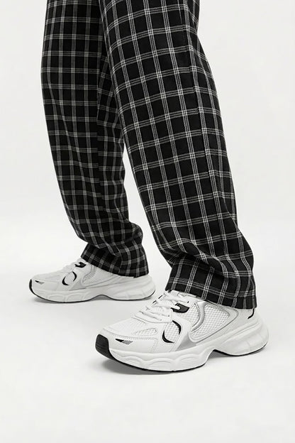 Close-up of chunky trainers showing their retro-inspired design