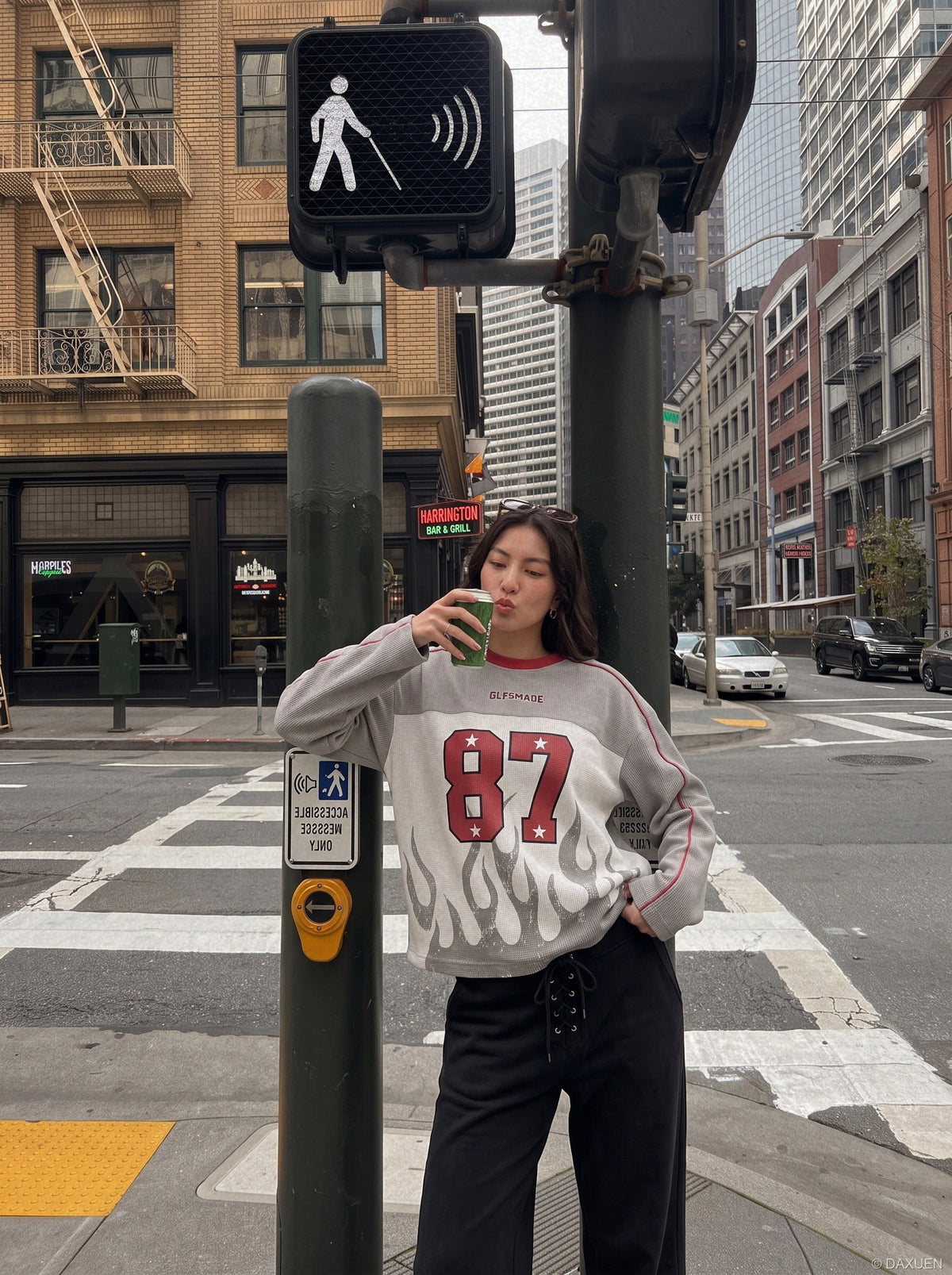Long-sleeve top showing the 87 flame chest graphic